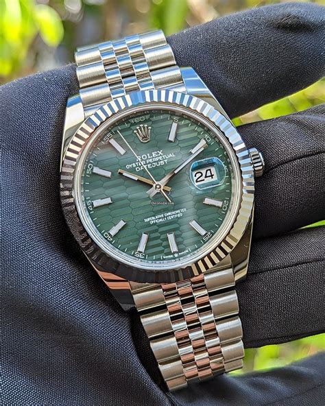 silver rolex green face